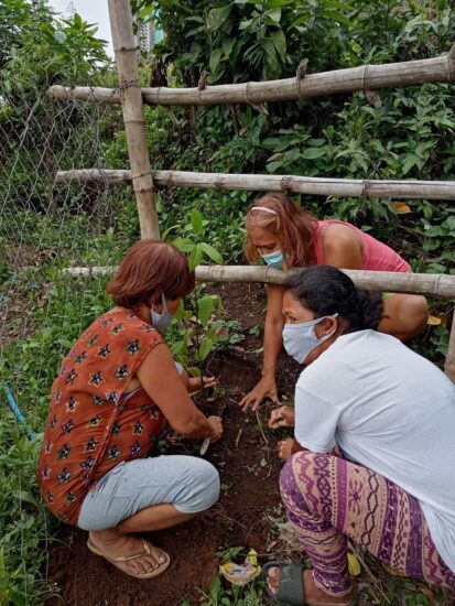 Women of Brgy. Pansol planting the seedlings