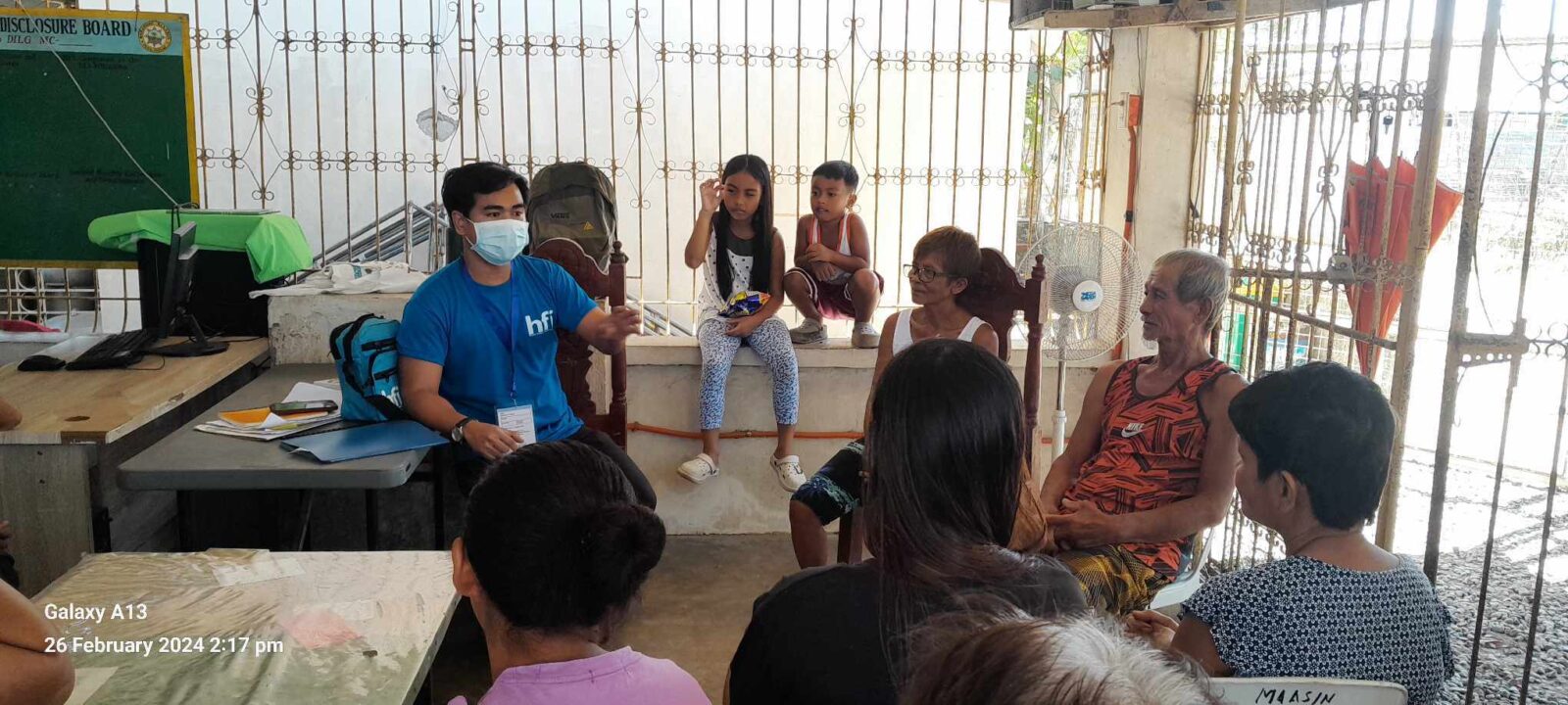 Nurse Cliff orients the community members about Community-Based Health and Wellness Program (CBHWP) in Barangay Maasin, Pura, Tarlac