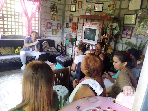 Nurse Dominique orienting the cluster group about Community-Based Health and Wellness Program (CBHWP) in Barangay San Vicente, San Manuel, Tarlac