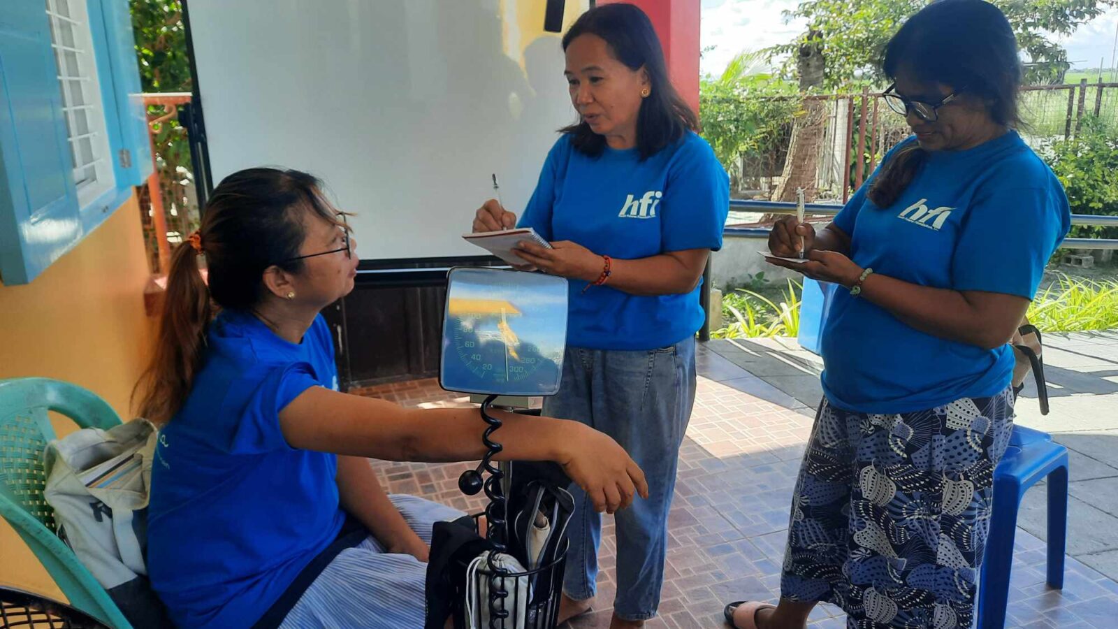 Barangay Health Workers (BHWs) practicing the interview of patient and accomplishment of forms for teleconsultations in Barangay Recuerdo, Nampicuan, Nueva Ecija
