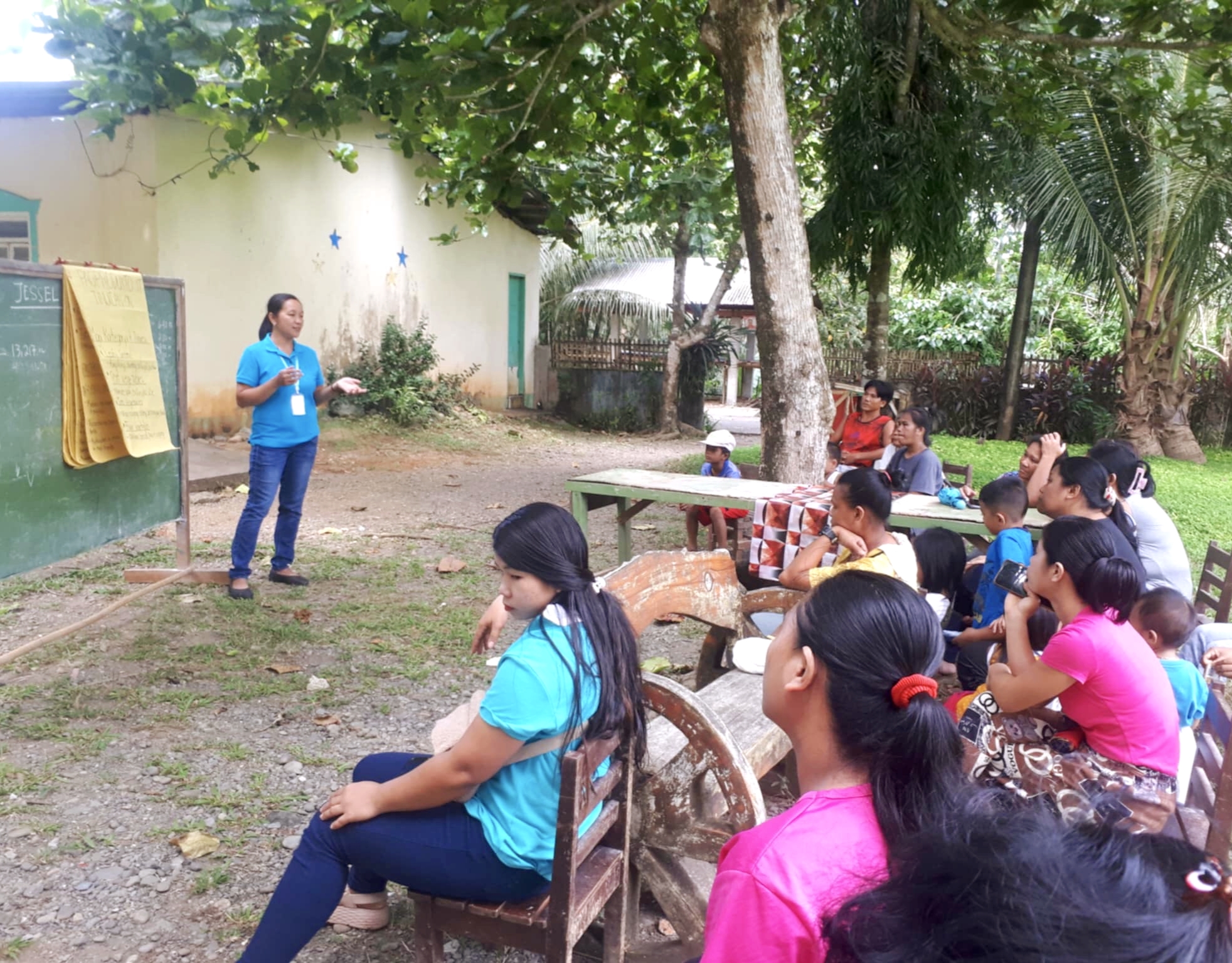 Ms. Joan conducts Nutrition Garden training for household beneficiaries of Barangay Navitas.