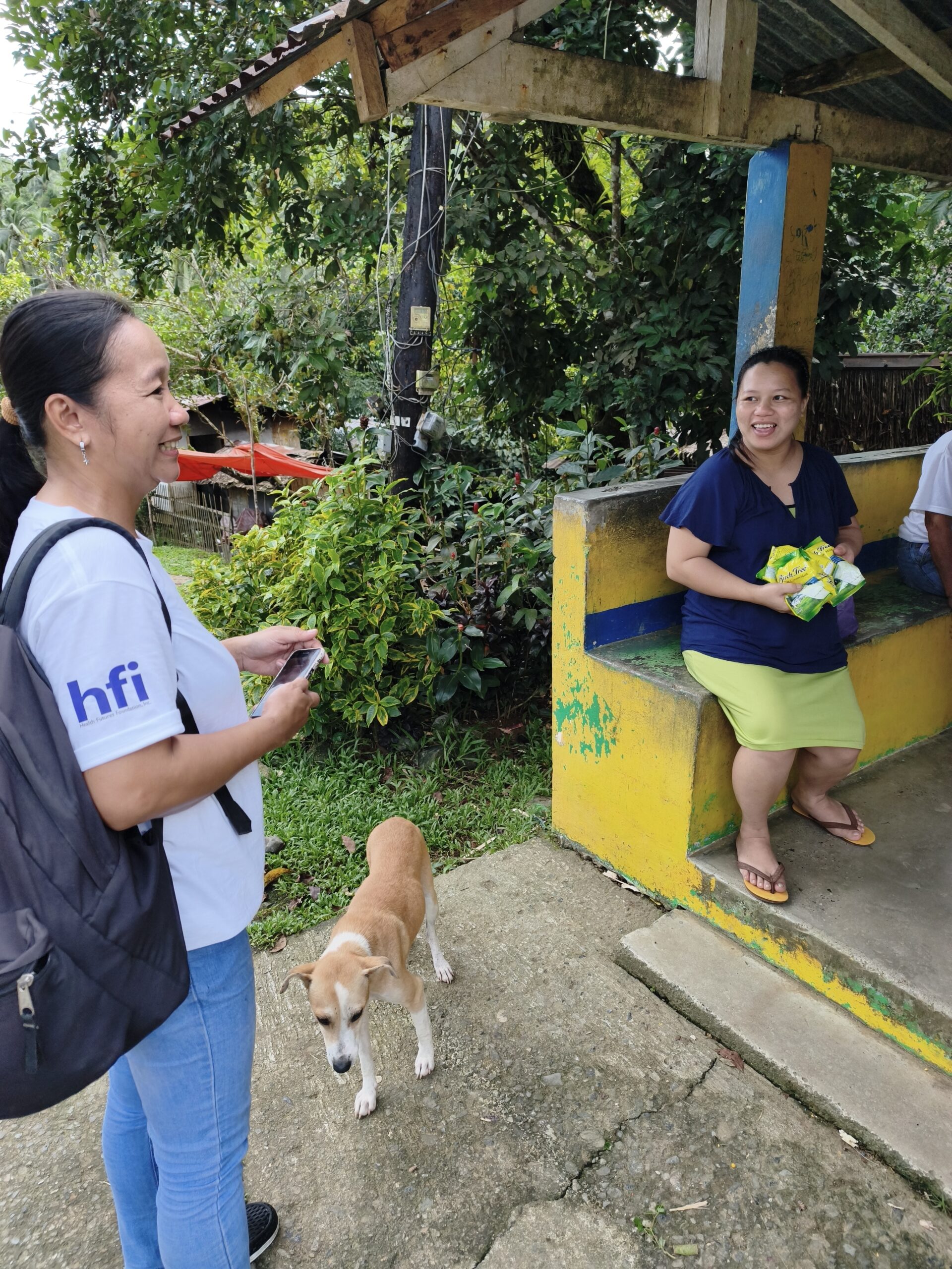 A pregnant mother beneficiary from Barangay Osman receiving support through the milk supplementation program to help improve maternal nutrition